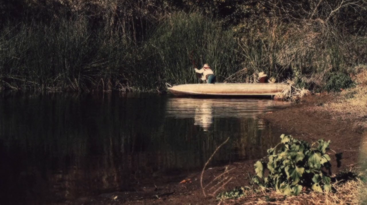 The siblings escapes using the boat.